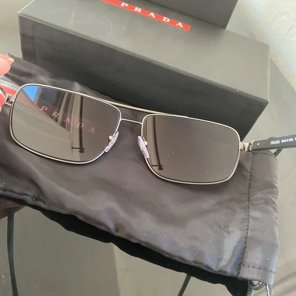Prada sunglasses with the glasses bag and box